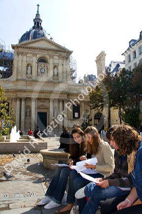 Students study near the Sorbonne in Paris, France.