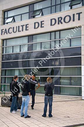 Students socialize in front of the Paul Verlaine University administrative building in Metz, France.