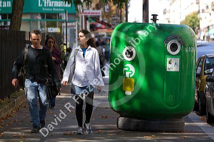 Curbside glass recycling bin in Paris, France.