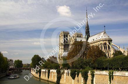 Notre Dame de Paris located along the Seine River in Paris, France.