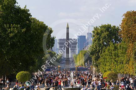 The Obelisk of Luxor and the Arch de Triomphe at the west end of the Avenue des Champs-Elysees in Paris, France.