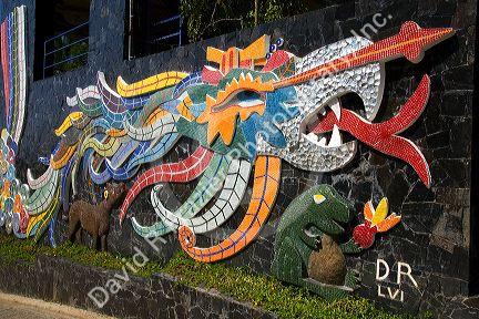 Mosaic artwork created by Diego Rivera along the outside wall of The House of the Winds where Dolores Olmedo Patino and Diego Rivera once lived, Acapulco, Guerrero, Mexico.