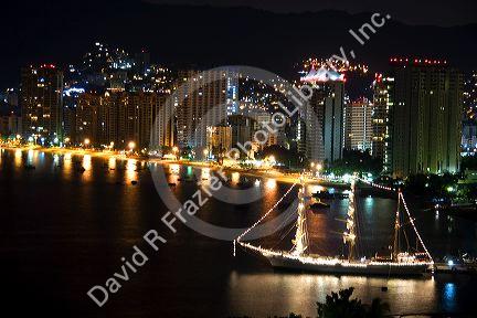 Night view of the Acapulco Bay and skyline, Acapulco, Guerrero, Mexico.