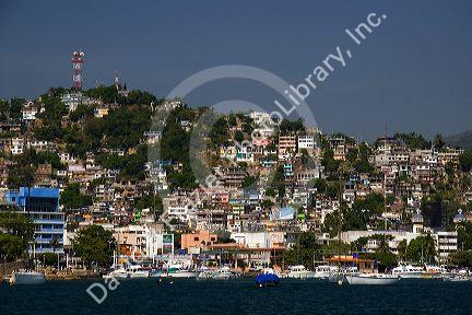 Cliffside housing along the bay at Acapulco, Guerrero, Mexico.