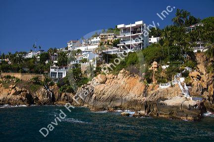 Cliffside housing along the bay at Acapulco, Guerrero, Mexico.