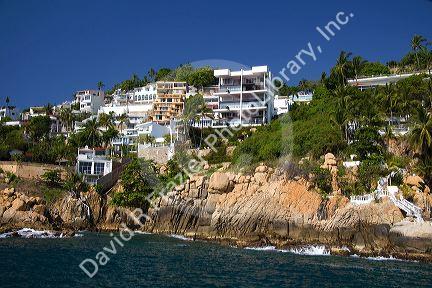 Cliffside housing along the bay at Acapulco, Guerrero, Mexico.