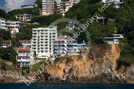 Cliffside housing along the bay at Acapulco, Guerrero, Mexico.