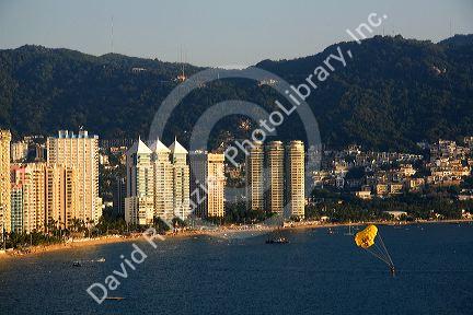 Acapulco Bay lined with hotels in Acapulco, Guerrero, Mexico.