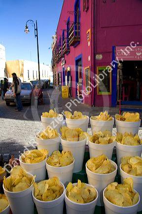 Street vendor selling handmade potato chips in the city of Puebla, Puebla, Mexico.