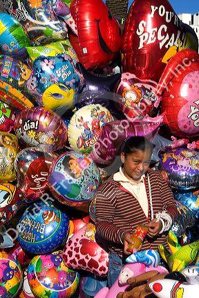 Street vendor selling balloons in the city of Puebla, Puebla, Mexico.
