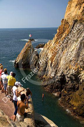 The La Quebrada Cliff Divers perform for the public from the cliffs of La Quebrada in Acapulco, Guerrero, Mexico.