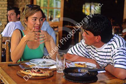 Couple dine at an outdoor cafe in Santiago, Chile.