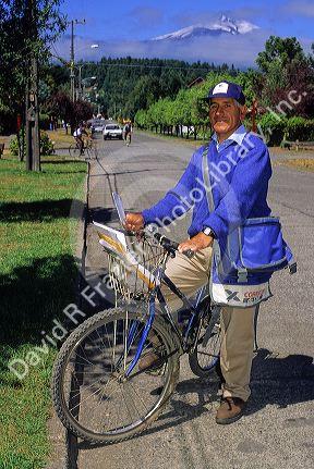 Postman on bicycle near Antuco, Chile.