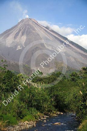 Arenal Volcano and fresh water stream near La Fortuna, San Carlos, Costa Rica.