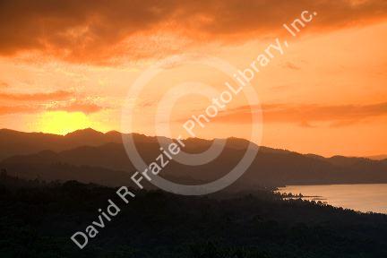 Sunset over the Cordillera Central from the Arenal Volcano National Park near La Fortuna, San Carlos, Costa Rica.