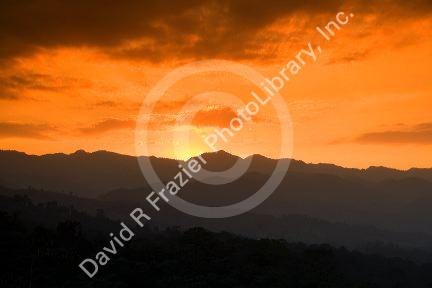 Sunset over the Cordillera Central from the Arenal Volcano National Park near La Fortuna, San Carlos, Costa Rica.