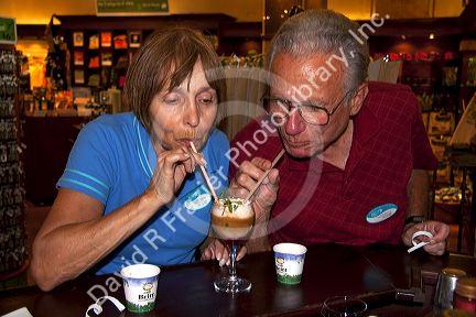 Tourists enjoy a coffee drink at the Britt coffee bar in San Rafael de Heredia, Costa Rica.