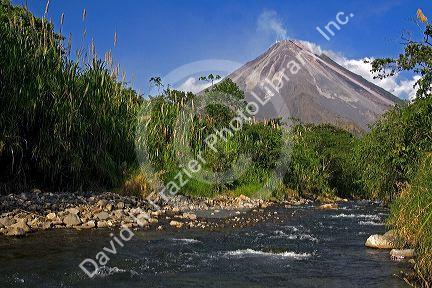 Arenal Volcano and fresh water stream near La Fortuna, San Carlos, Costa Rica.