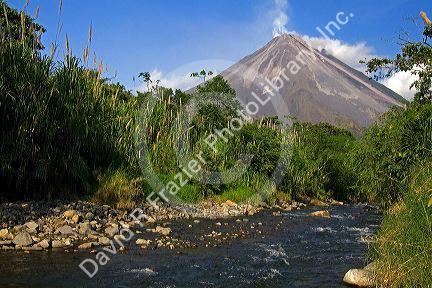 Arenal Volcano and fresh water stream near La Fortuna, San Carlos, Costa Rica.
