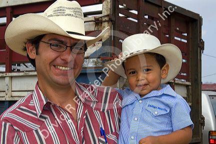 Costa Rican rancher and his son at Liberia, Costa Rica. MR