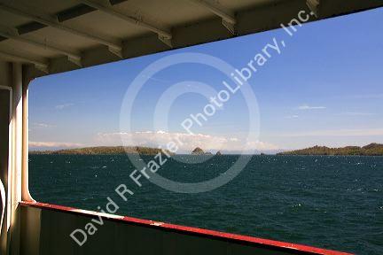 A car ferry traveling on the Gulf of Nicoya from Playa Naranjo to Puntarenas, Costa Rica.
