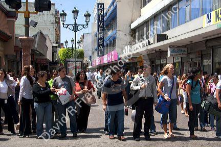 Pedestrians on a walking street in San Jose, Costa Rica.