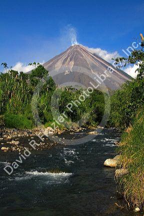 Arenal Volcano and fresh water stream near La Fortuna, San Carlos, Costa Rica.