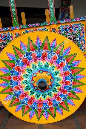 Carretas are elaborately painted oxcarts in the city of Sarchi Norte, Cosat Rica.  This view is a detail of a wheel.