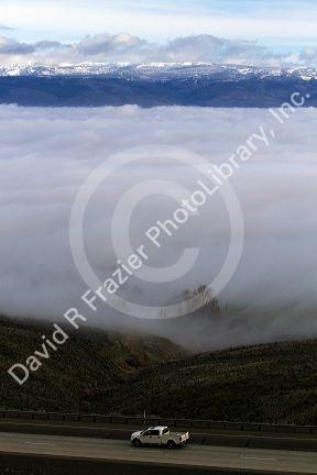 Valley fog and the Cascade Range near Ellensburg, Washington, USA.