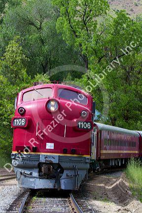 The Thunder Mountain Line scenic tourist train traveling along the Payette River between Horseshoe Bend and Banks, Idaho, USA.