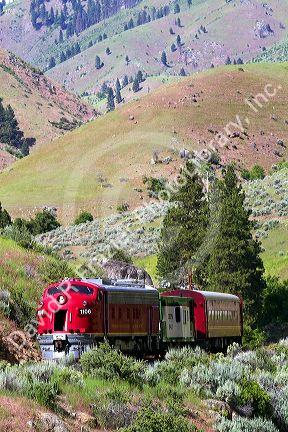 The Thunder Mountain Line scenic tourist train traveling along the Payette River between Horseshoe Bend and Banks, Idaho, USA.