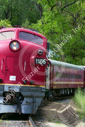 The Thunder Mountain Line scenic tourist train traveling along the Payette River between Horseshoe Bend and Banks, Idaho, USA.