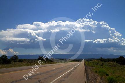 Stratocumulus clouds building over the desert near Cuba, New Mexico, USA.