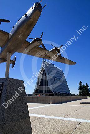 Bronze sculpure of vintage WW11 aircraft in front of the Cadet Chapel at the Air Force Academy in Colorado Springs, Colorado, USA.