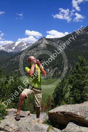 Photographer in the Rocky Mountain National Park, Colorado, USA.