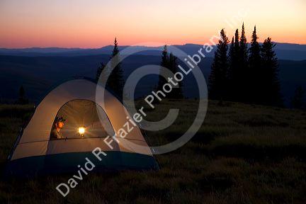 Tent camping at the summit of Green Mountain along the historic Magruder Corridor road that devides the Frannk Church-River of No Return Wilderness Area and the Selway-Bitterwoot Wilderness in Idaho, USA.