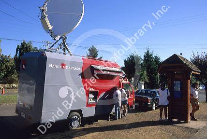 An armored car with an automatic teller machine for public use in Chile.