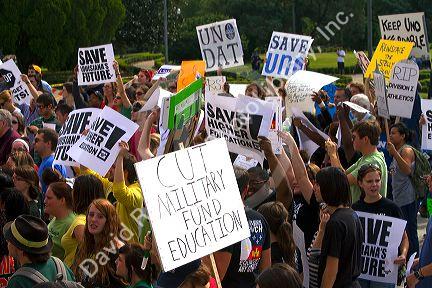 Demonstrators protest educational funding cuts on the steps of the state capitol building in Baton Rouge, Louisiana, USA.