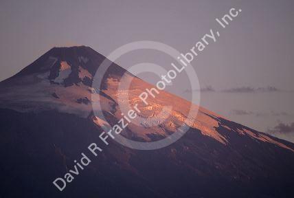 Evening sun reflects off snow on Villarica Volcano near Pucon, Chile.