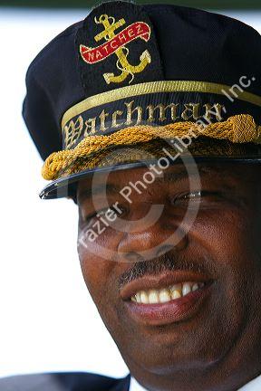 Watchman crew member of the SS. Natchez steamboat on the Mississippi River at New Orleans, Louisiana, USA.