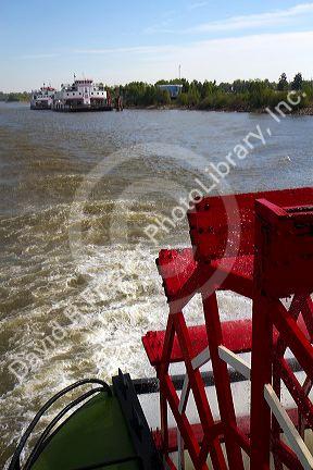 Paddle wheel of the SS. Natchez steamboat on the Mississippi River at New Orleans, Louisiana, USA.