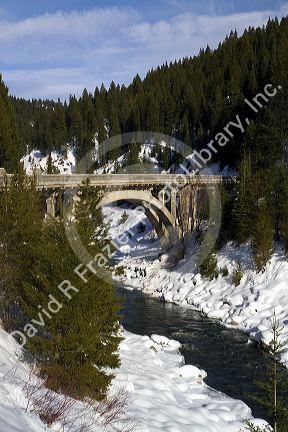The Rainbow Bridge spanning the North Fork of the Payette River during winter, Valley County, Idaho, USA.