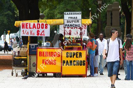 Street vendors selling ice cream and hot dogs in Buenos Aires, Argentina.