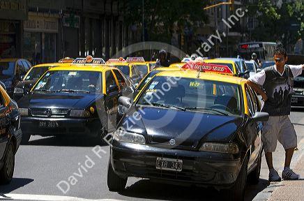 Taxi's on Cordoba Avenue in the Retiro barrio of Buenos Aires, Argentina.