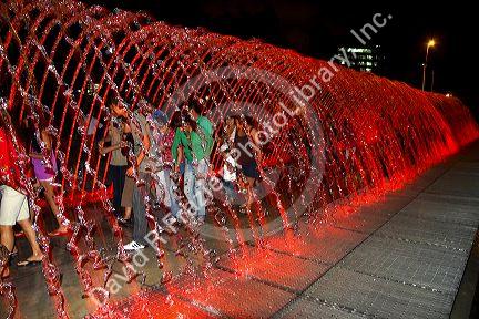 Water fountains light up at night in the Magic Circuit of Water park in Lima, Peru.