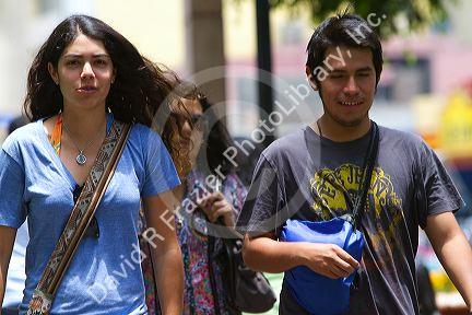 People walking in Central Park of the Miraflores district of Lima, Peru.