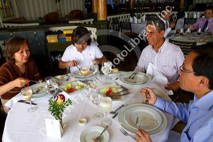 People dine at La Rosa Nautica restaurant in Lima, Peru.