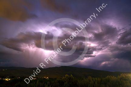 Lightning strikes during a thunderstorm on the first day of summer in Boise, Idaho, USA.