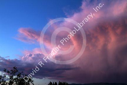 Summer storm cloud at sunset over the foothills near Boise, Idaho, USA.