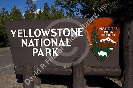 Yellowstone National Park entrance sign, West Yellowstone, Montana, USA.